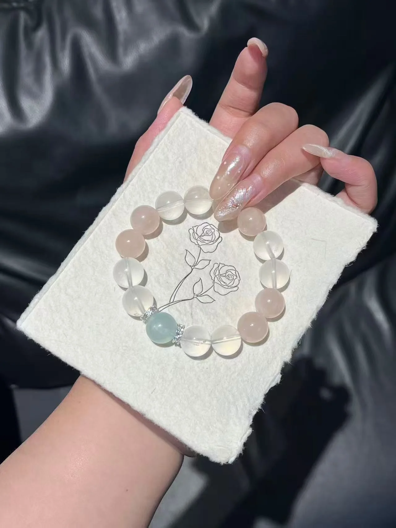 Pink and white bracelet reference for Fire-inspired warm color direction
